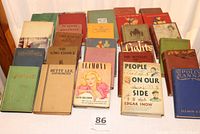 Overview of 30 assorted hardback fiction books from late 19th century to mid-20th century, showing varying cover colors and design styles, arranged in multiple rows on a surface.