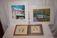Overview of all four prints including two larger scenic prints and two smaller framed female portraits.
