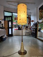 Full front view of lamp on showroom floor, unlit