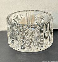 Front side view of clear Waterford Crystal small bowl showing detailed cut fan and starburst patterns on sides