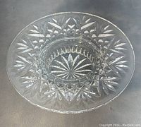 Top view of round Waterford crystal candle holder showing detailed cut pattern and central candle cavity