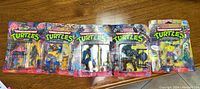 Five TMNT figures in original blister cards lined up