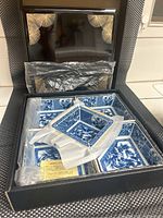 Photo showing entire vintage Japanese Takomi 5-compartment porcelain serving set in original box with black lacquer tray behind compartments.