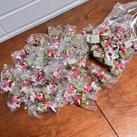 Lot of 50 Piglet Christmas figures individually bagged, showing quantity and packaging