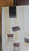 Box showing Silvio brand and images of the cutlery case open and closed