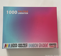 Box front showing 1000 piece tactile laminated jigsaw puzzle, Rainbow Gradient design by Illustrator Artmoon.