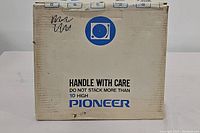 Original boxed packaging with Pioneer branding and 'Handle With Care' label.