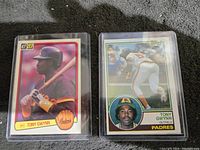 Front side of both 1983 Tony Gwynn rookie cards in plastic sleeves showing player images and team logos.