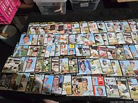 Wide layout of 1971 Topps baseball cards showing approximately half the lot arranged on a surface with various players visible.
