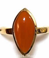 Close-up top view showing the marquise-shaped carnelian stone set in a polished silver band