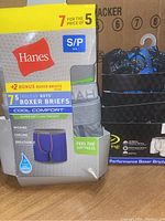 Front packaging of 7 pairs tagless boys' boxer briefs by Hanes, Cool Comfort, size Small (6-8).