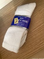 White diabetic sock with loose fit top, size medium (13-15), made in USA, designed for diabetes, edema, neuropathy.