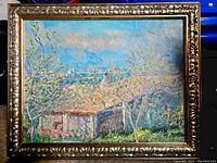 Frontal photo of the framed lithograph showing the entire artwork and ornate frame.