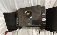 Front view of Coby micro CD stereo system and two speakers on each side