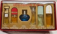 Full view of Elizabeth Arden 6 piece fragrance set in original box showing all six bottles and packaging details.
