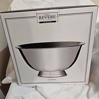 Box packaging of Paul Revere Silveramiths 12 inch bowl with product image on front.