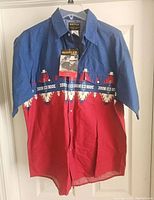 Front view of Rustler western short-sleeve button-up shirt with color block and southwestern pattern