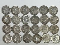Top view of 24 Roosevelt dimes arranged in 4 rows of 6, showing obverse side with Roosevelt profile and visible dates.