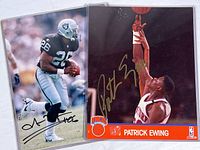 Photo showing both autographed 8x10 sports photos in archival sleeves featuring Patrick Ewing of New York Knicks and Napoleon Kaufman of Oakland Raiders side by side.