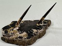 Overall view of the dual pen set featuring two Sheaffer pens mounted on a polished marble base with natural rough edges.