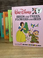 Front cover of Walt Disney Birds and Trees, Flowers and Bees Volume 7 featuring Snow White and Dopey