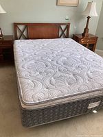Full assembled bed showing headboard, frame and mattress