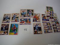 22 Montreal Expos baseball cards from 1984 arranged showing various players and team cards.