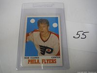 Front view of 1992 OPC Bobby Clarke hockey card showing the player in Philadelphia Flyers uniform with clear card text and image.