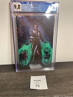 Front cover of Magic #1 comic graded CGC 9.8 showing female character with green magical energy by Aaron Bartling.