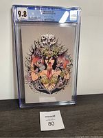 Front of the CGC graded Die!Namite #2 comic showing the 9.8 grade, Peach Momoko Virgin Exclusive cover with detailed fantasy artwork.