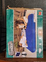 Photo of Comfort Quest air mattress original packaging showing brand, product image, and condition.