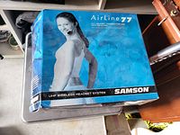 Packaging box of Samson AirLine 77 UHF wireless headset system with front image and branding.