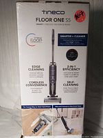 Sealed retail box showing Tineco Floor One S5 Smart Cordless Vacuum & Wash branding and features