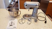 Full lot including mixer, bowl, splash shield, three attachments and manual