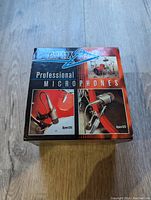 Box of Apex Professional Microphones showing images of Apex 125 and Apex 126 models.