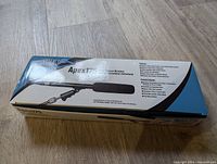 Box of Apex 175 condenser microphone showing product information and image of microphone.