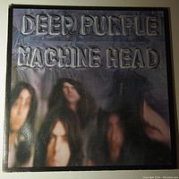 Front cover of Deep Purple Machine Head vinyl LP showing distorted band photo and embossed text.