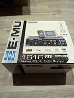 Box of E-MU 1616m Laptop Digital Audio System showing front with branding and product image.