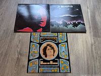 Photo showing all three Jon Anderson vinyl records with original album covers: "3 Ships," "Song of Seven," and "Animation."