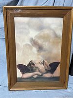 Photo of framed whimsical pig angel art with wood frame.
