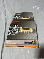 Two packages of Buyers Products LED Light Strips 36 inch Clear Warm 54 LEDs, front view showing branding and product details
