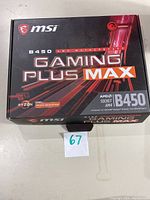 Closed MSI B450 Gaming Plus Max motherboard box showing branding and motherboard chipset details.