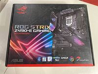 Front of sealed retail box showing model name and ROG Strix branding