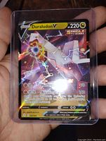 Front view of Duraludon V holo foil Pokémon card displaying full art and detailed design with Single Strike emblem.