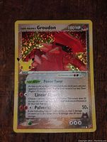 Clear image of the Team Magma's Groudon holographic Pokemon card, showing holographic foil details and card text.