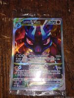 Front view of the Lucario VSTAR full art holofoil Pokemon card showing detailed artwork and power stats.