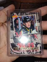 Front of Mario Lemieux 1994-95 The Franchise hockey card showing Lemieux in Pittsburgh Penguins jersey with card branding and year visible.