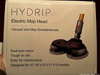Box front showing Hydrip branding and product details including Dyson model compatibility and electric mop head features.