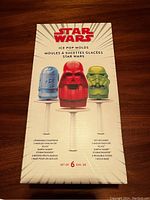 Box of Star Wars ice pop moulds by Williams Sonoma with character images and product details.