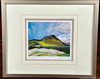 Full view of the framed print showing the artwork titled "Lake Wabagishik" by Franklin Carmichael.